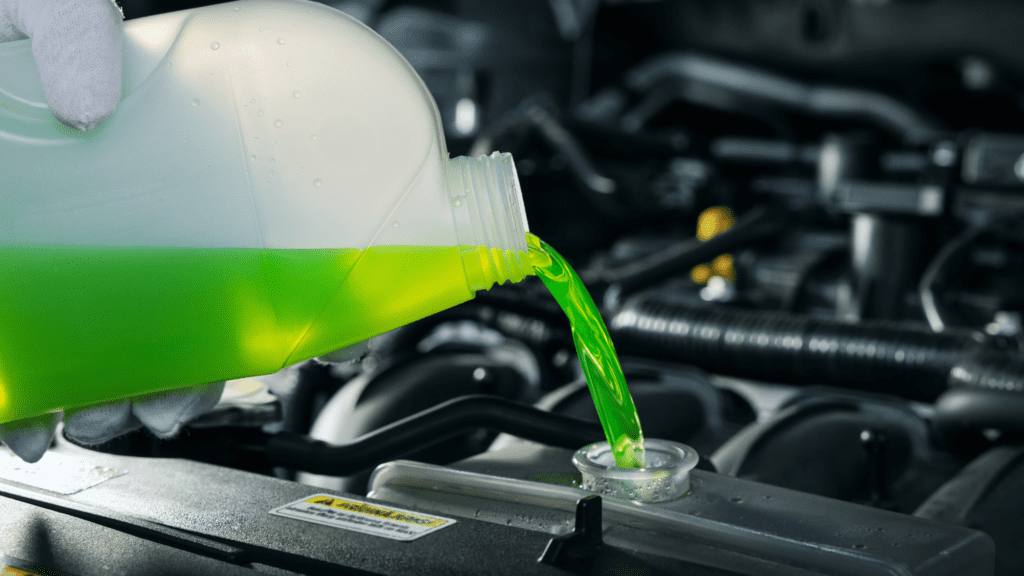 Jaguar Anti-Freeze System Repair & Maintenance Easy DIY Steps showing a coolant reservoir and tools ready for service